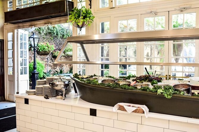 Court of Two Sisters Live Jazz Brunch Buffet with Mimosa - A courtyard brunch at 613 Royal Street