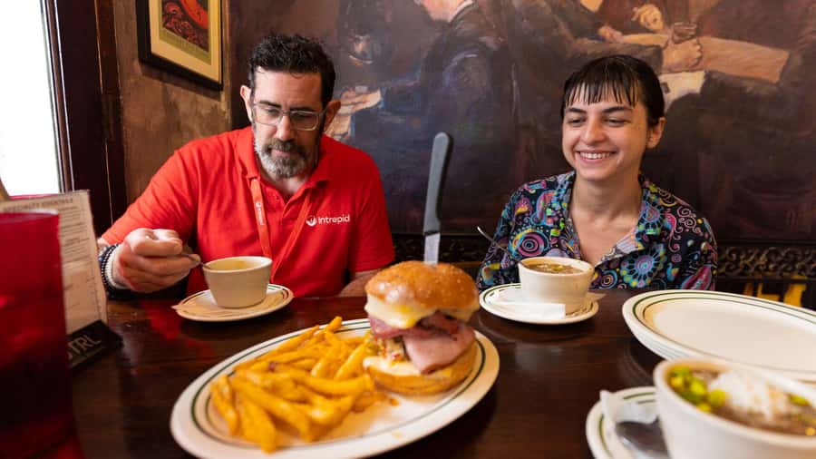New Orleans: Beloved Bites & Famous Dishes Food Tour - Gumbo, hot sauce, and the Cajun-Creole table