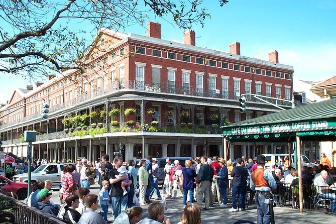 New Orleans City and Cemetery 2-Hour Bus Tour - Garden District mansions under the oaks