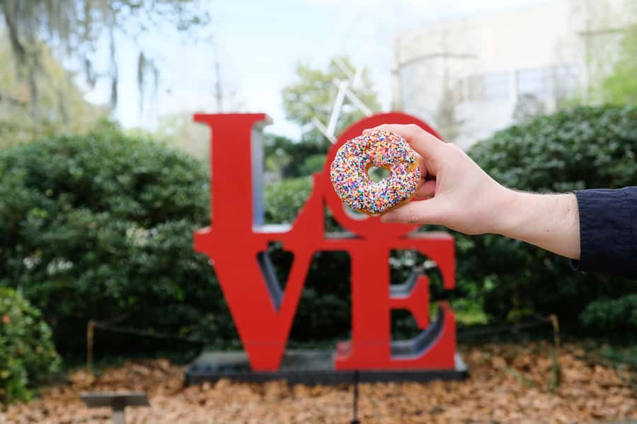 New Orleans: Guided Delicious Beignet Tour with Tastings - Walking Magazine Street between the tastings