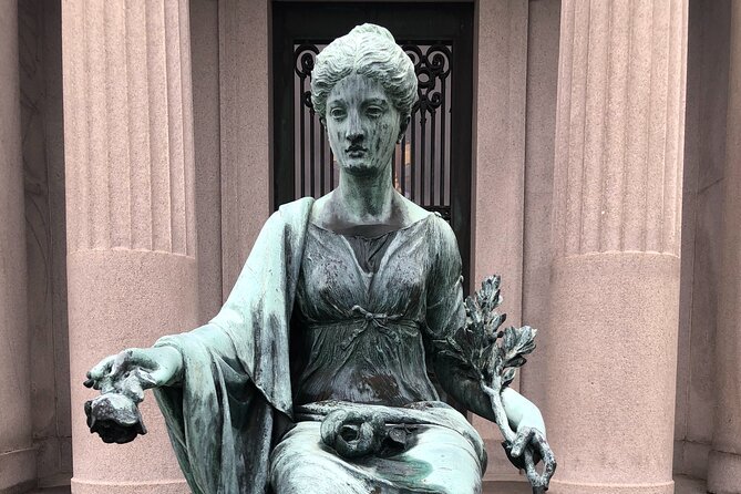 New Orleans Metairie Cemetery Tour: Millionaires and Mausoleums - Marble tombs, temples, angels, and symbols