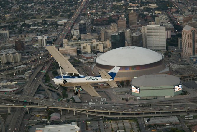 New Orleans VIP Sightseeing Flight with Champagne & Chocolates or Wine & Cheese - Following the Mississippi toward the Crescent City view